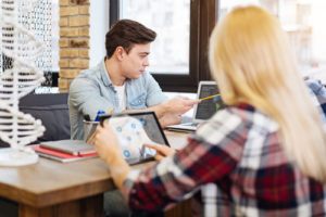 Digital learning in action as smart students study together.