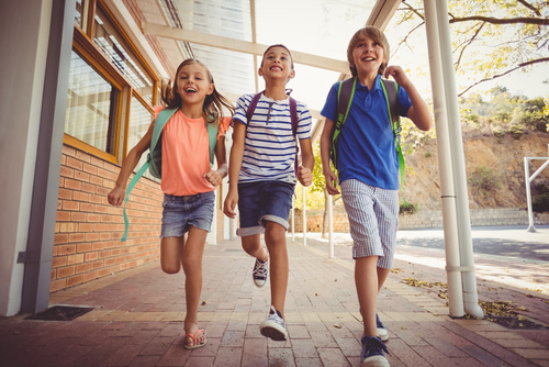 Happy children demonstrate the impact of creating a positive school climate.