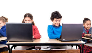 Two students on laptops
