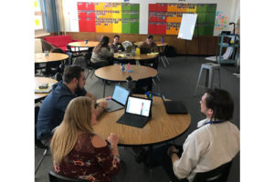 Students working independently in a classroom.