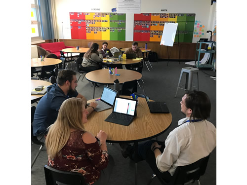 Students working independently in a classroom.