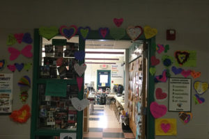 Hearts with student's writing are all over the classroom door