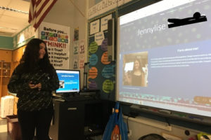 a student leading her parent teacher conference