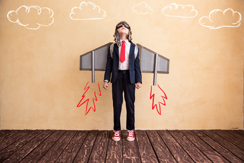 Personalized success plans can help students excel, like this student in a rocket ship.