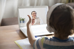 istance learning has become a new reality for many learning institutions across the country, like this boy giving a thumbs-up as he learns online.