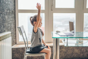 Child engaged in virtual class
