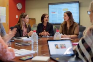 To create useful, sustained teacher PD in schools and districts, align efforts with school-specific needs and district-wide goals