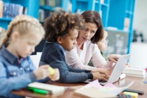 In a dynamic blended learning environment, the teacher is a facilitator of learning, mentoring and guiding students as they progress.