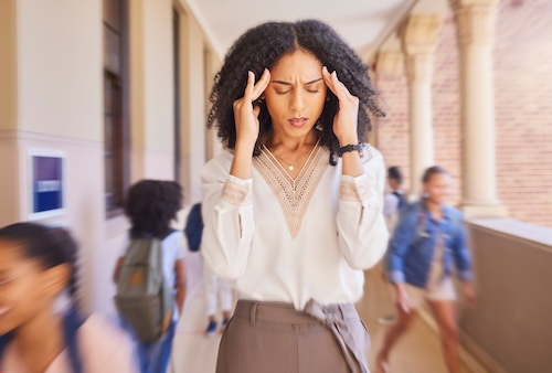Student behavior challenges, low compensation, and administrative demands are driving teacher stress, burnout, and turnover.