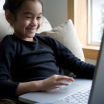 girl-playing-computer-game Educators say game-based learning inspires math enthusiasm.